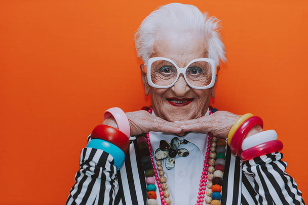 Funny grandmother portraits. Senior old woman dressing elegant f - Φωτογραφία, εικόνα