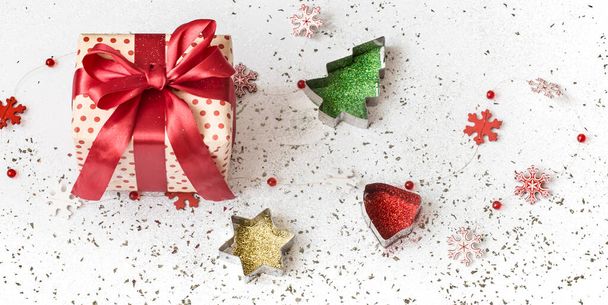New year white festive background with gift tied with red ribbon - Fotoğraf, Görsel