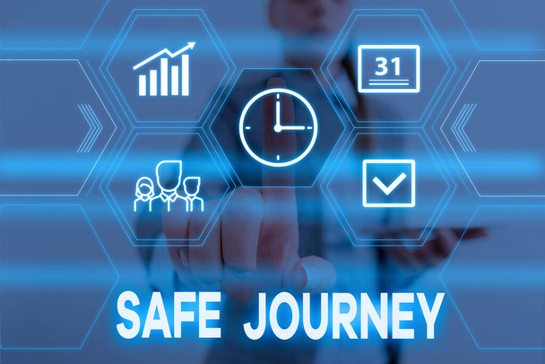 Conceptual hand writing showing Safe Journey. Business photo text polite way of wishing someone a safe journey or Safe Travel Woman wear work suit presenting presentation smart device. - Photo, Image