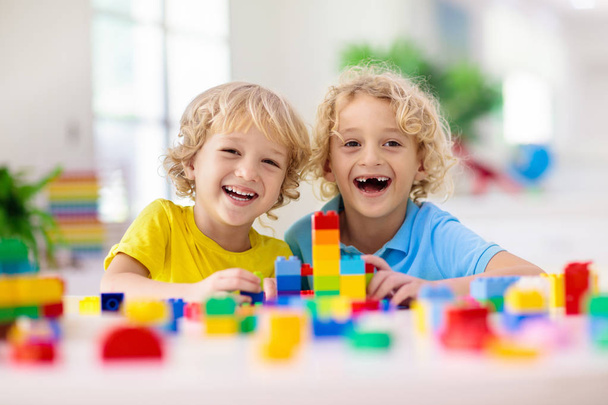 Child playing with toy blocks. Toys for kids. - Photo, Image