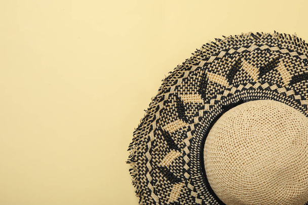 Stylish hat on beige background, top view. Space for text - Φωτογραφία, εικόνα