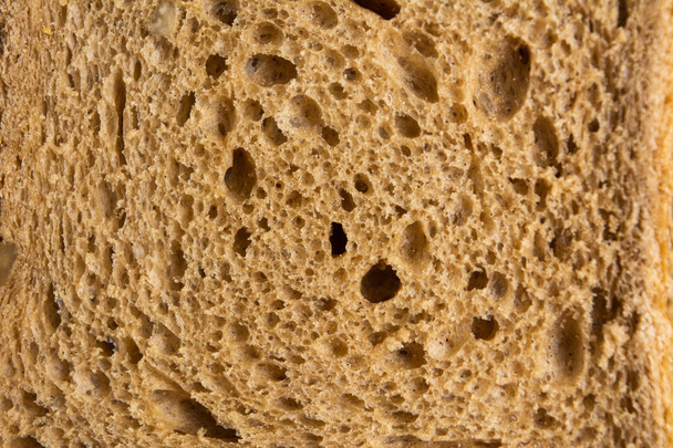 Brown bread slice background pattern - Photo, Image