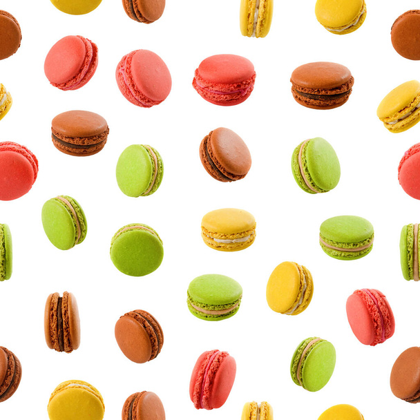 Sweet and colorful dessert macarons isolated on white background.Seamless image. - Fotó, kép