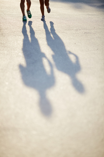 Shadows of runners - Photo, Image