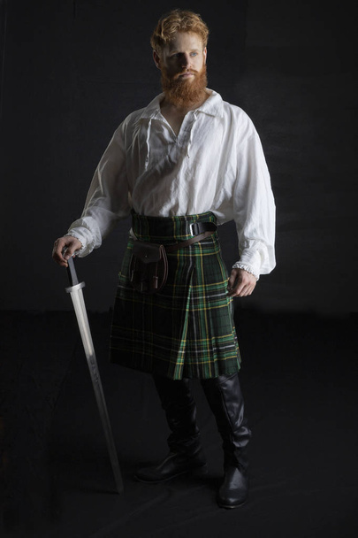 Jonge Schotse man met rood haar en een baard - Foto, afbeelding