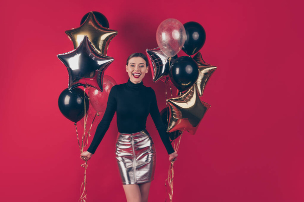 Portrait of her she nice-looking pretty attractive fascinating cheerful cheery glad positive girl holding in hands air balls 14 February isolated on maroon burgundy marsala red pastel color background - Фото, зображення