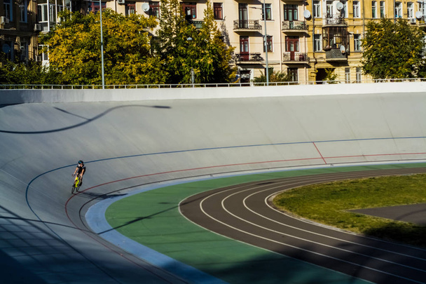 Modern, large, multicolored stadium and bike track for sportsmen. Bicycles. Active rest. Sport. - Zdjęcie, obraz