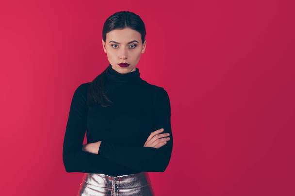 Portrait of strict pensive lady cross her hands stare true leader in her work career wear black turtleneck silver glowing dress mini skirt isolated over red color background - Foto, Imagem