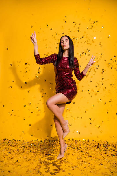 Vertical full length body size view of nice attractive lovely gorgeous slim fit cheery girl showing v-sign dancing having fun pout lips isolated on bright vivid shine vibrant yellow color background - Фото, зображення