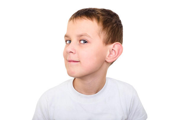 Close-up van portret van jongen met aandacht te luisteren - Foto, afbeelding