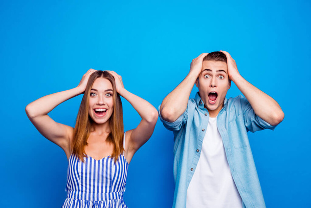Portrait of his he her she two nice attractive charming lovely cheerful cheery people showing omg expression isolated over bright vivid shine vibrant blue turquoise color background - 写真・画像
