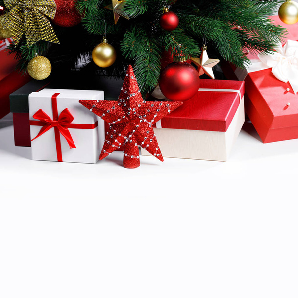 Christmas gifts under the tree - Фото, зображення