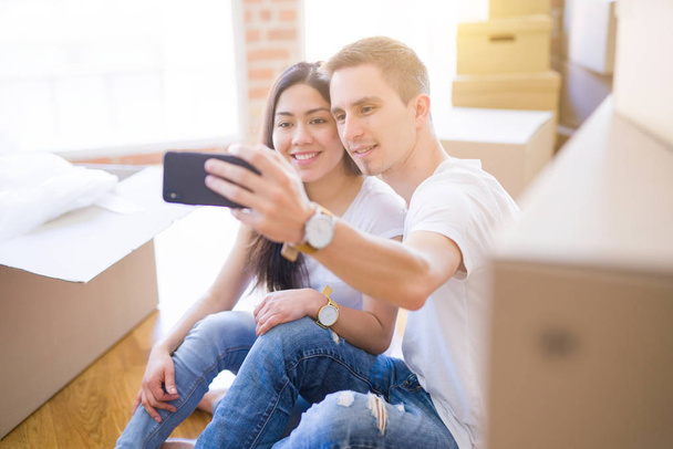 happy young couple taking selfie with smartphone - Fotó, kép