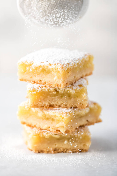 Lemon squares with powdered sugar. - Photo, Image