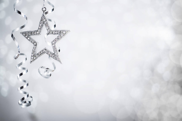 Silver Christmas star and ribbon - Fotoğraf, Görsel