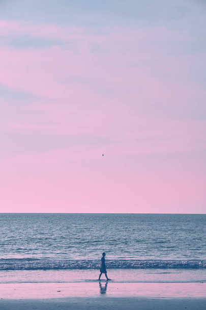 Girl on the beach during sunset - Zdjęcie, obraz