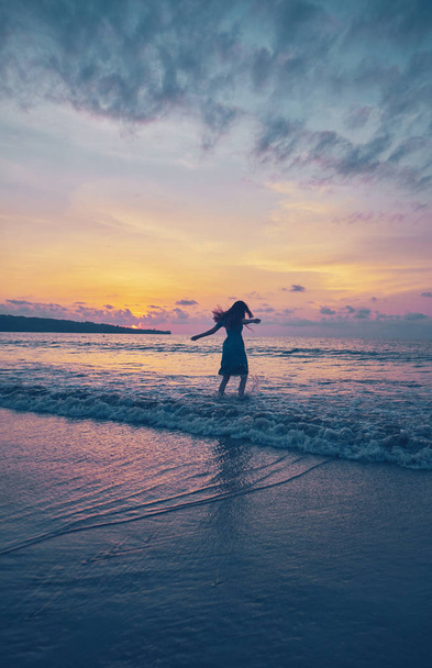 Girl on the beach during sunset - Foto, Imagem