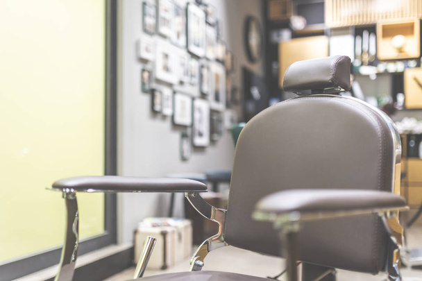 Retro armchair in hairdresser barbershop - 写真・画像