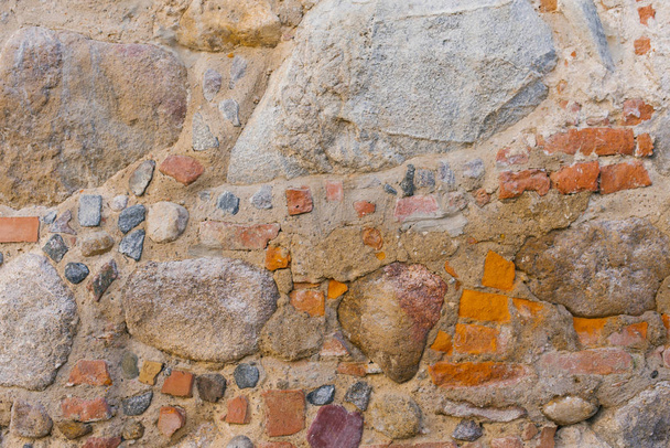 Het steenwerk is oud, de achtergrond van de stenen - Foto, afbeelding