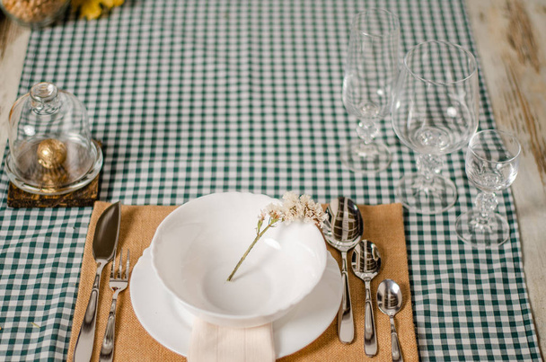 Beautiful table setting with lavender flowers on wooden background - Foto, afbeelding
