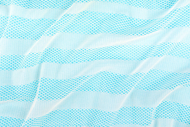 Blue fabric lace texture. Blue white cloth perforation backgroun - 写真・画像