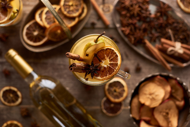 selective focus of traditional pear mulled wine with spices in glass - Fotó, kép