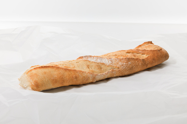 fresh baguette on textured white background - Foto, Imagen