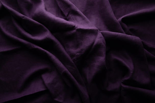 top view of purple crumpled cloth - Foto, afbeelding