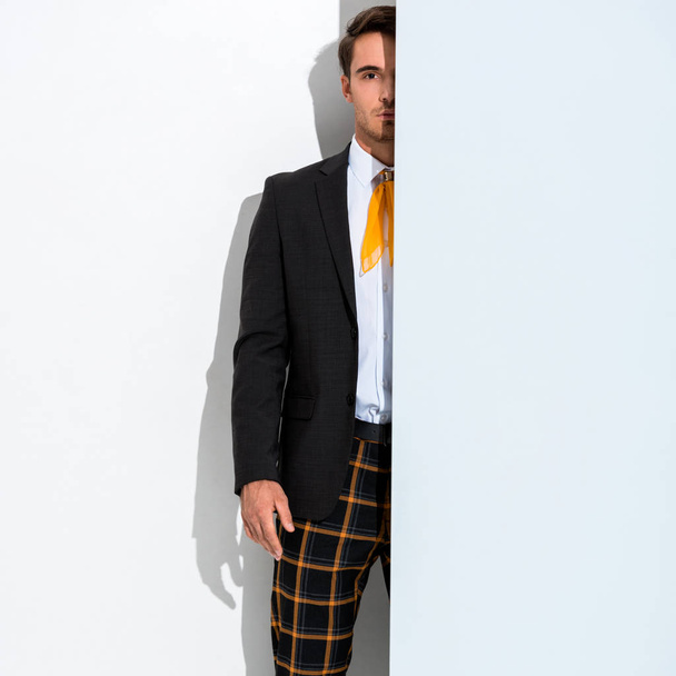 cropped view of stylish man in trendy formal wear on white  - Foto, afbeelding