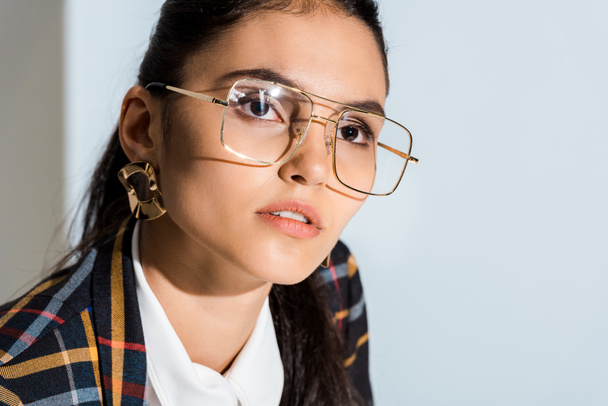 attractive young woman in glasses on white  - Fotó, kép