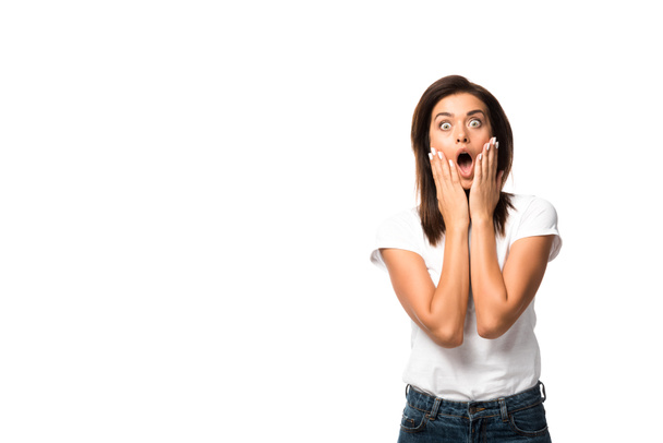 beautiful shocked woman in white t-shirt, isolated on white - Foto, imagen