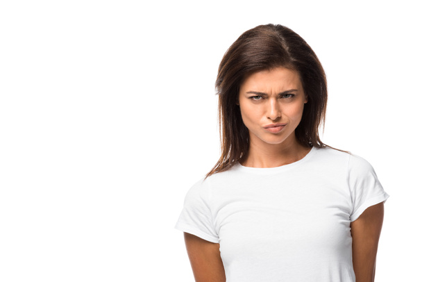 thoughtful woman in white t-shirt looking at camera, isolated on white - Φωτογραφία, εικόνα