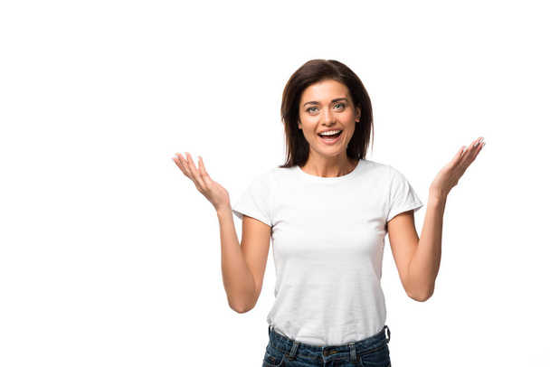 excited cheerful woman with shrug gesture, isolated on white - 写真・画像
