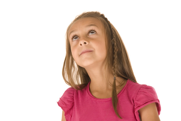 Cute young brunette girl in dark pink shirt looking up - Foto, Imagem