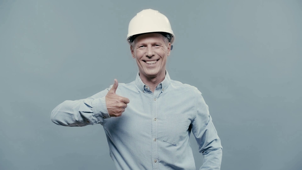 усміхнений архітектор в шоломі показує великий палець вгору
  - Кадри, відео