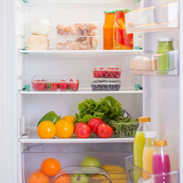  white fridge with different food - Фото, изображение