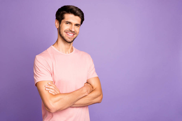 Portrait of his he nice attractive handsome cheerful cheery content bearded guy freelancer wearing pink tshirt folded arms isolated over violet purple lilac pastel color background - Photo, image