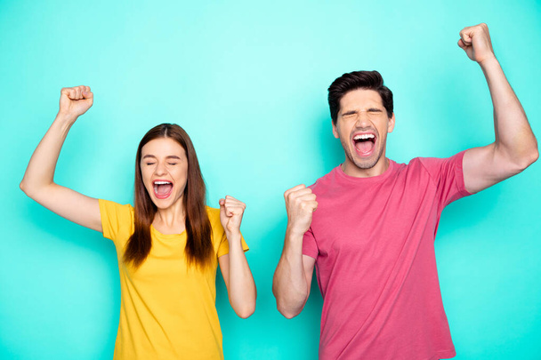 Portrait of his he her she nice attractive overjoyed crazy cheerful cheery couple celebrating spring sale discount great news isolated over bright vivid shine vibrant green blue turquoise background - Fotoğraf, Görsel