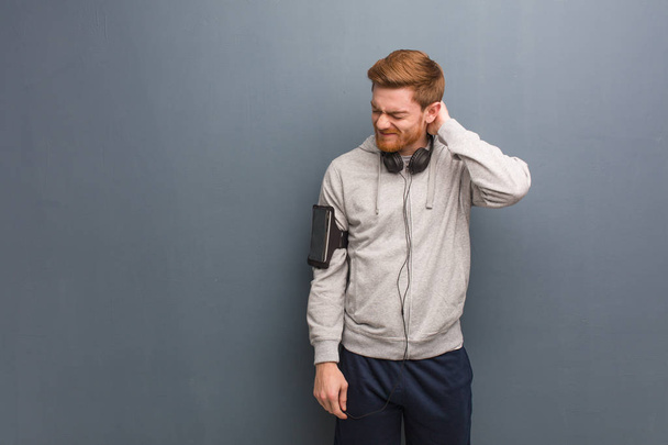 Young fitness redhead man suffering neck pain - Fotografie, Obrázek