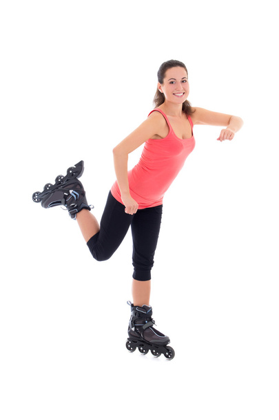 pretty woman posing on roller skates isolated on white - 写真・画像