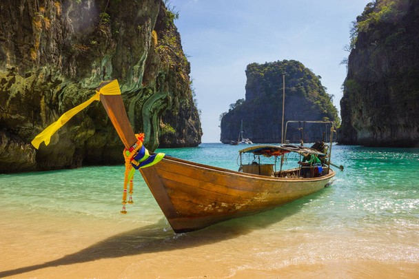 Boats at sea against the rocks in Thailand - Photo, Image