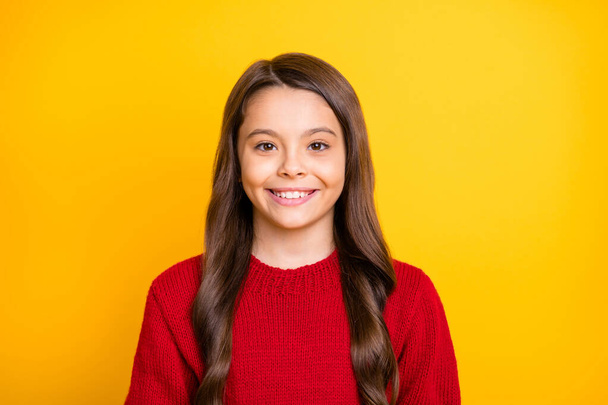Close up photo of positive cheerful satisfied kid look listen have fun with her friends wear red jumper isolated over yellow color background - Fotó, kép