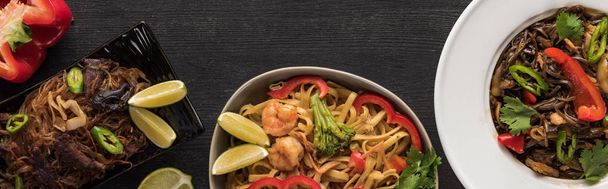top view of meat thai noodles on wooden grey surface, panoramic shot - Photo, Image