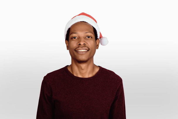 happy man in christmas hat. - Foto, Imagen