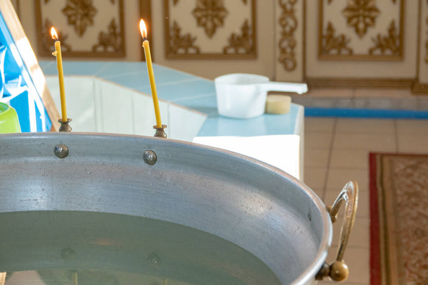A bowl of water for baptism in the Orthodox Church - 写真・画像
