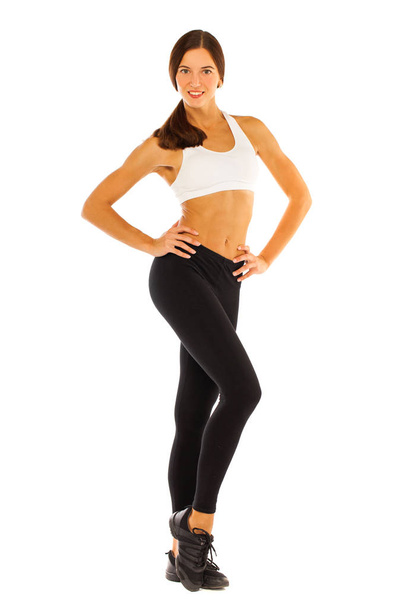 Sexy fitness woman posing in studio - isolated on a white backgr - Zdjęcie, obraz