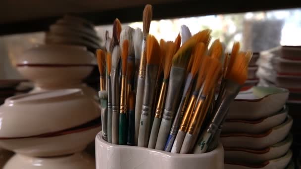 Painting Brushes in Ceramic Workshop  - Footage, Video