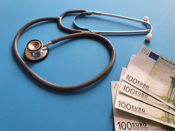 investment in health care, European money and stethoscope for medical check - Valokuva, kuva