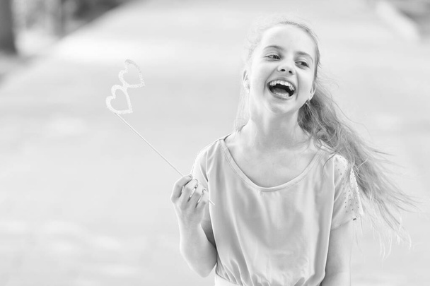 Summer holidays. Happy day. Smile my best accessory. Girl carefree child. Smile suits her. International childrens day. Happiness joy and fun concept. Laughing all day. Kid long hair happy smile face - Fotografie, Obrázek