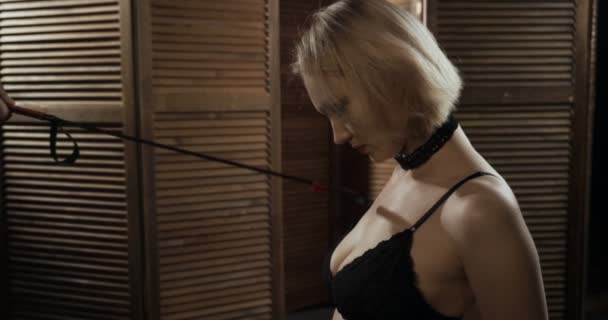 Blonde submissive woman slave is kneeling. - Footage, Video